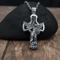 A sterling silver pendant in the shape of Archangel Michael's shield—a religious necklace made of ebony.